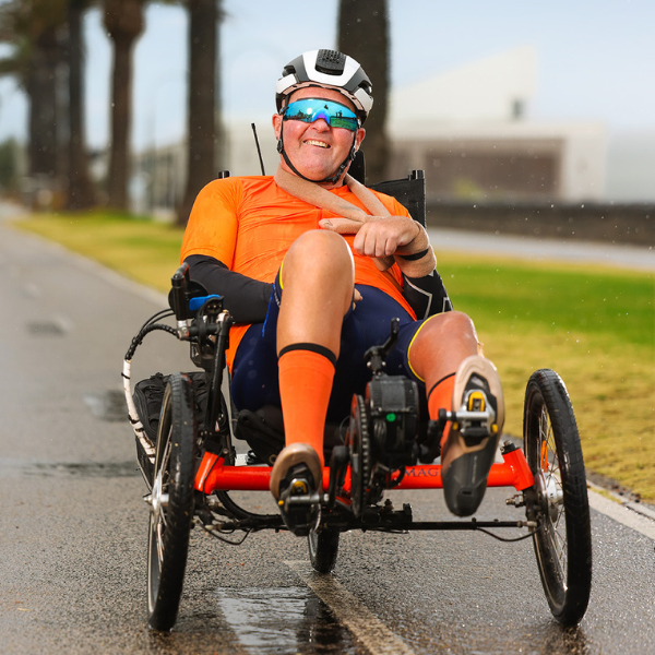 Jamie Melba Support Services SIL riding bike